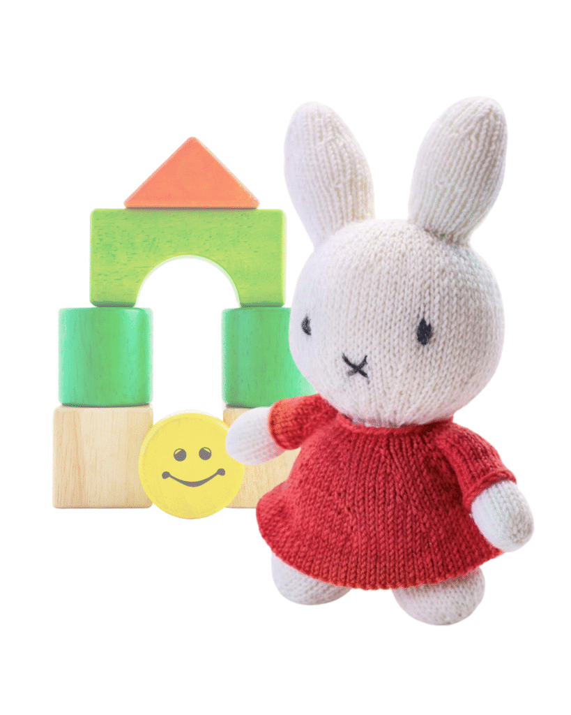 knitted Miffy toy, miffy the rabbit wearing a red dress, knitting pattern by jane burns
